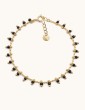 Bracelet chaine avec perles de céramique noires en plaqué or